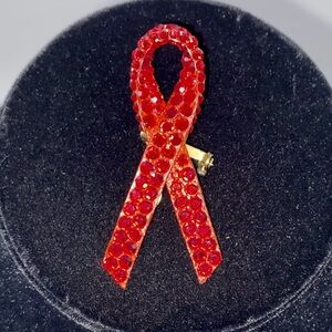 James Arpad 1990’s Red Crystal on Leather AIDS Awareness Ribbon Pin Collectible